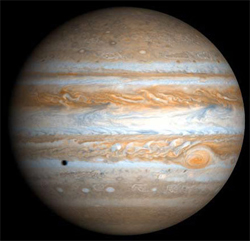 木星圖片中的木衛十六(黑點）