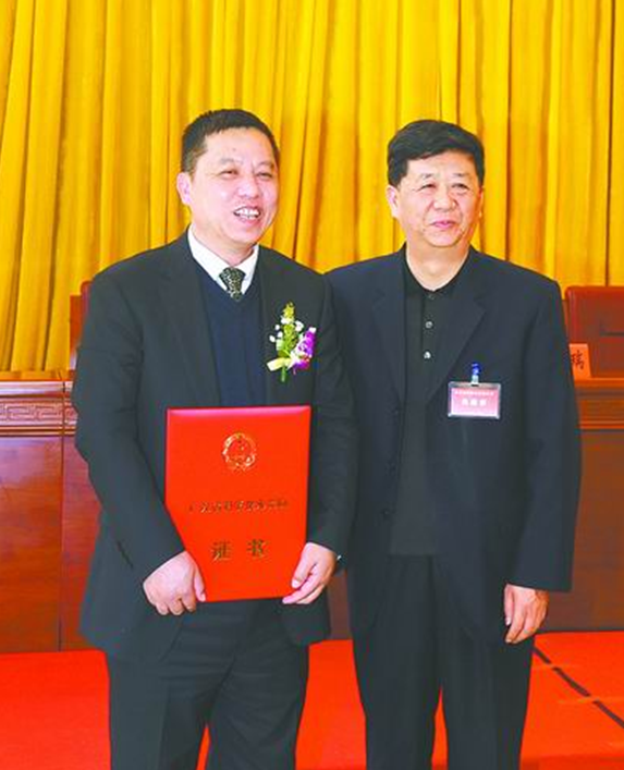 華南理工大學黨委書記杜小明（右）與李烈軍