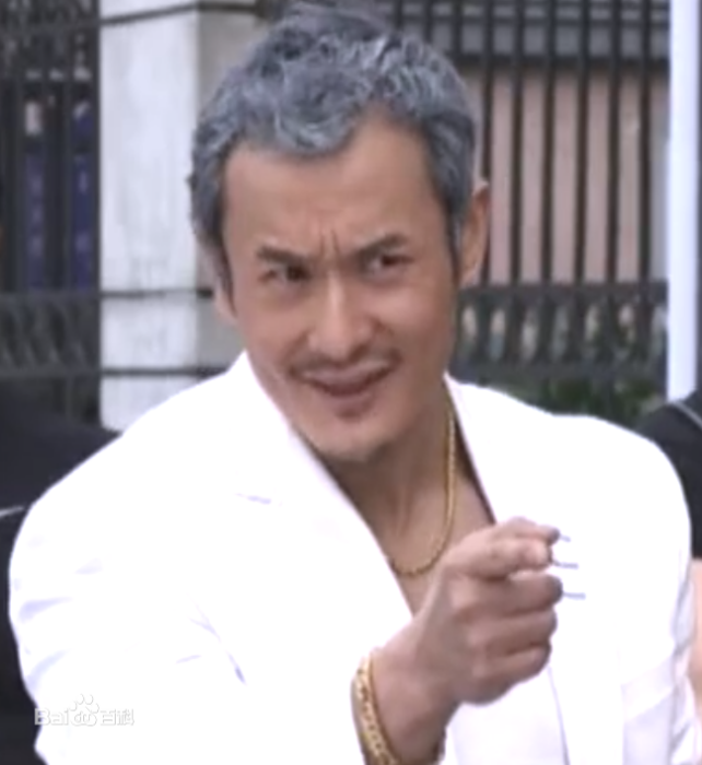 譚英國