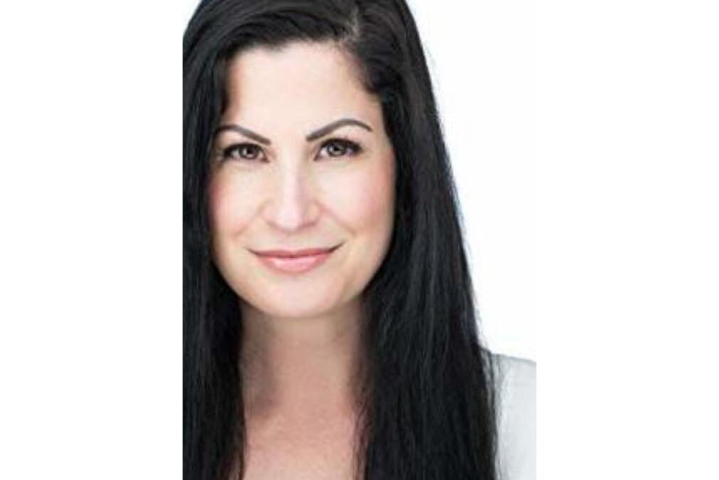 Anita S Martin