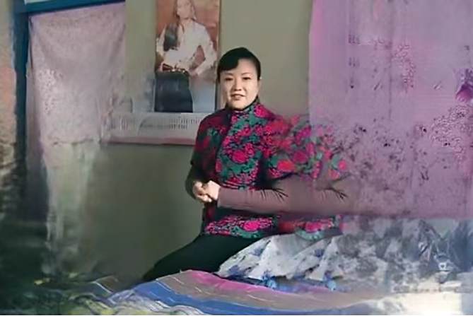 吳艷萍(《喜臨門》中的角色，由周笑莉飾演)