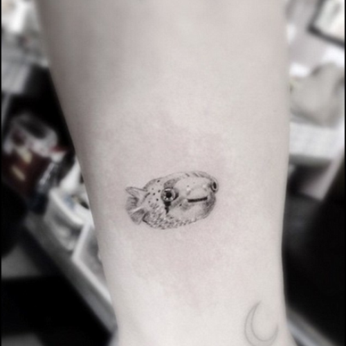 麥莉的魚紋身