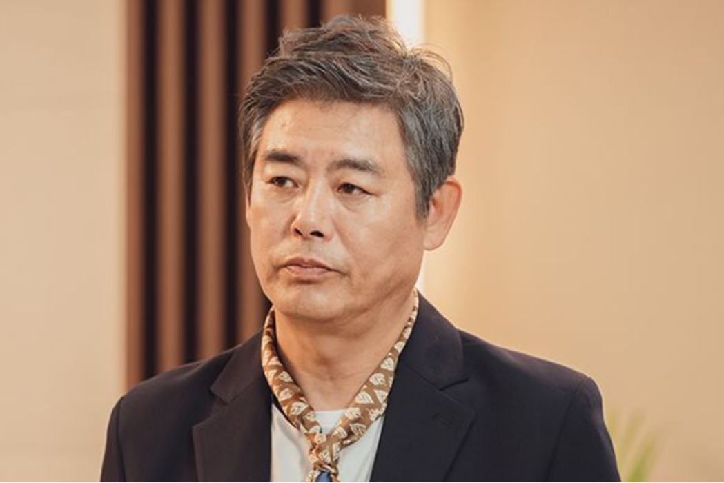 吳周明