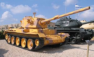 御夫座坦克裝備了20磅炮的晚期型號，裝有抽菸器