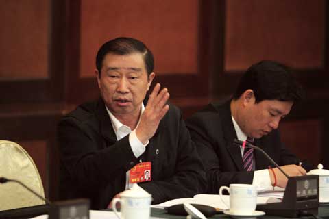 圖為周昌貢參加十一屆全國人大一次會議在湖南組討論時發言。