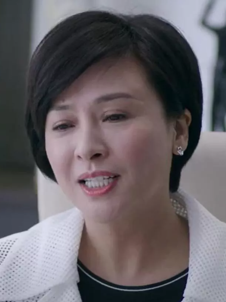 穆明(《大貓兒追愛記》中的廣告公司創意部經理)