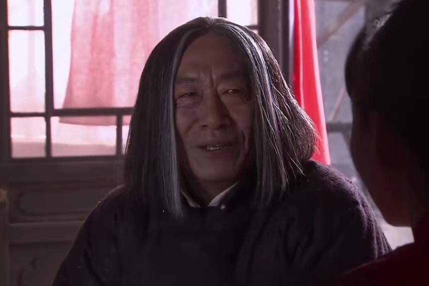 洪七(《蓮花》中蓮花的舅舅,由王奎榮飾演) 洪七(《蓮花》中蓮花的舅舅,由王奎榮飾演)