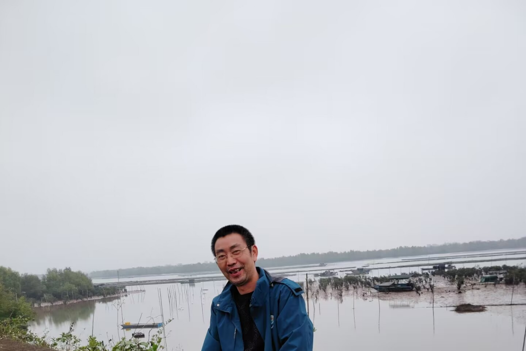 王日明(北部灣大學教授)