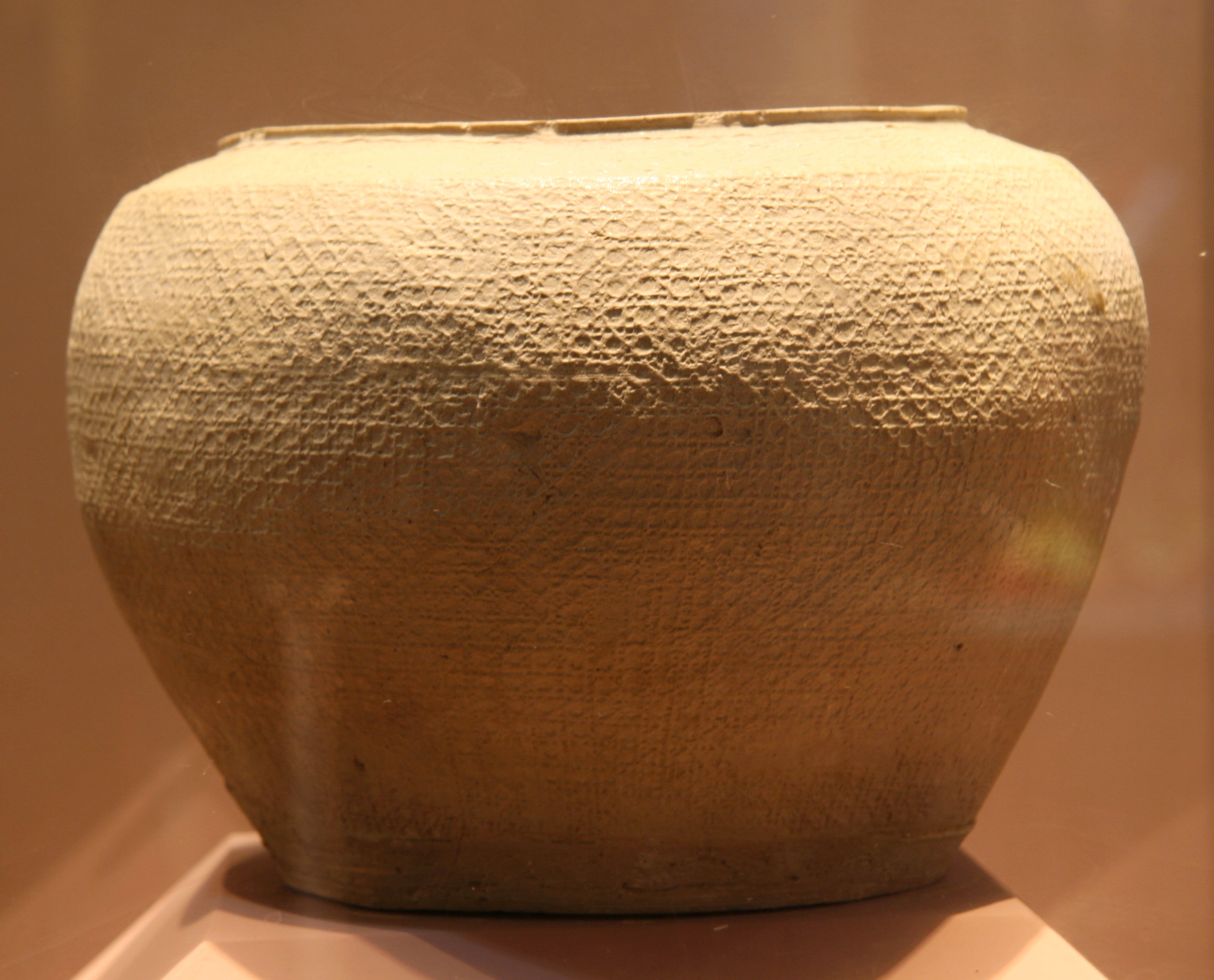 原始青瓷米篩紋罐