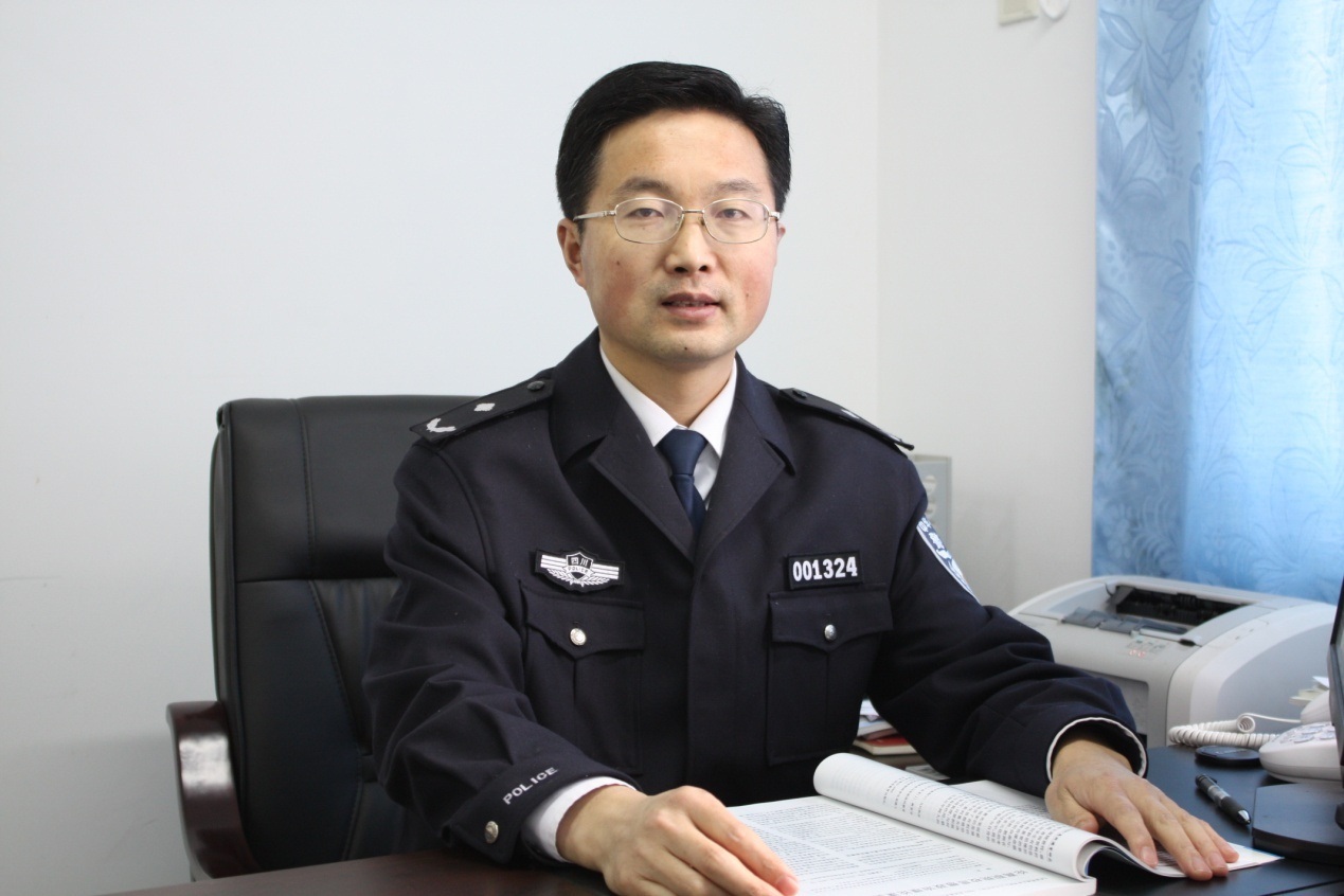 周長明(四川警察學院副院長)