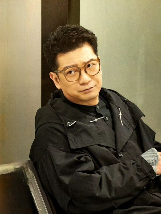 薛易明