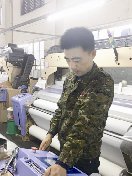 肖勇(江蘇今達紡織實業有限公司機修班班長) 肖勇(江蘇今達紡織實業有限公司機修班班長)