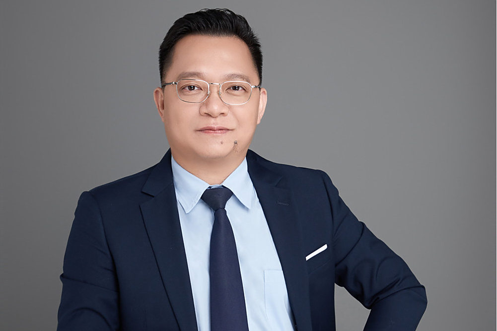 梁國德