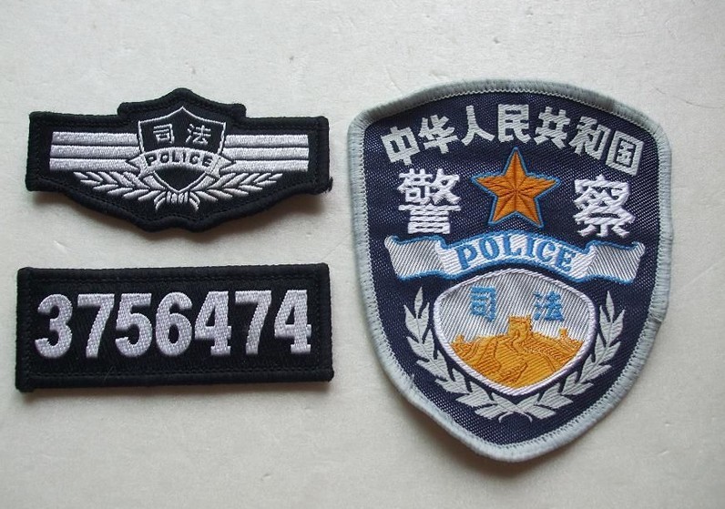 監獄警察臂章、胸標和警號