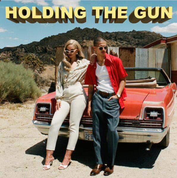 Holding The Gun Holding The Gun