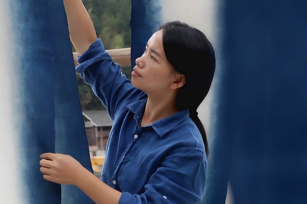 楊成蘭(中國非物質文化遺產侗族服飾技藝傳承人，榕江縣倚山人手造生活工作室創始人)