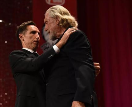 2018年，唐·尼爾森在名人堂儀式上與納什擁抱