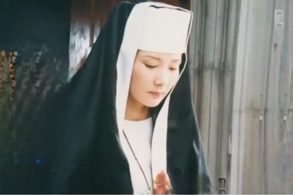 聞如錦