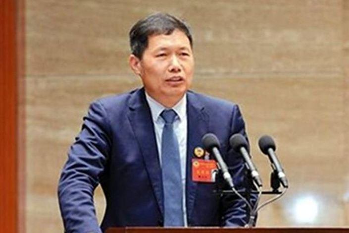 覃九三