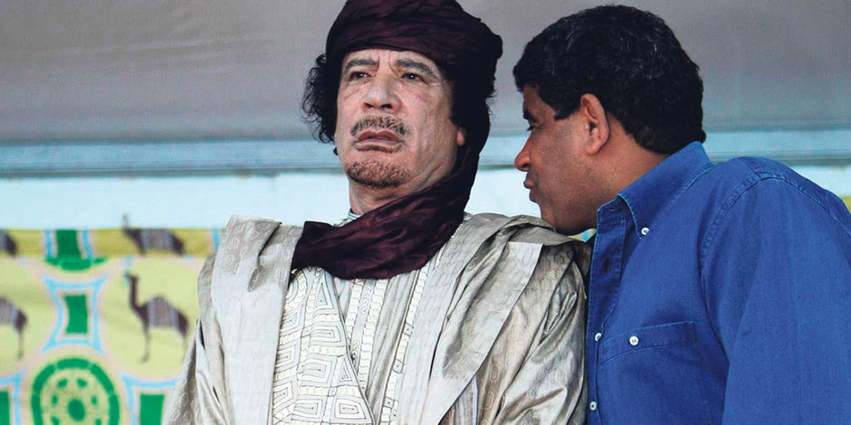阿卜杜拉·塞努西（右）與卡扎菲交流