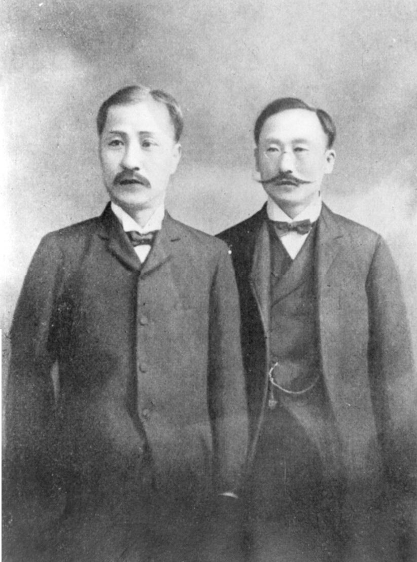 宋秉畯（左）和李容九