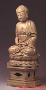 米黃釉阿彌陀佛瓷像