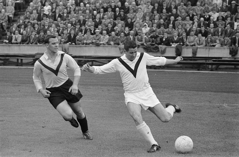 1960年的拉恩（右）在賽場上