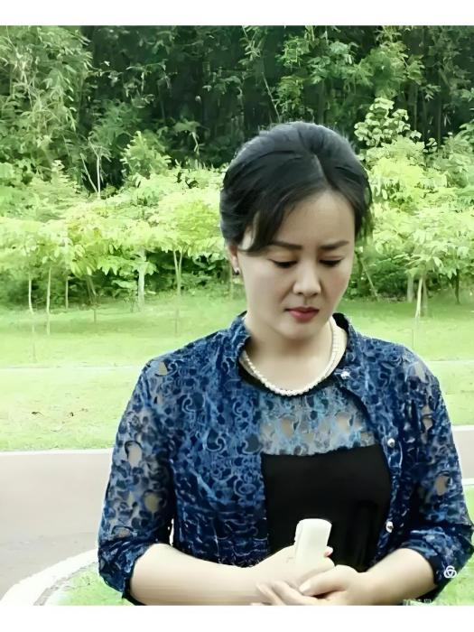 金玉蘭(《刀鋒下的替身》中由范春霞飾演的角色) 金玉蘭(《刀鋒下的替身》中由范春霞飾演的角色)