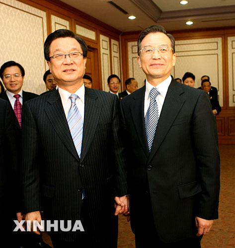 姜在涉（左）與溫家寶總理